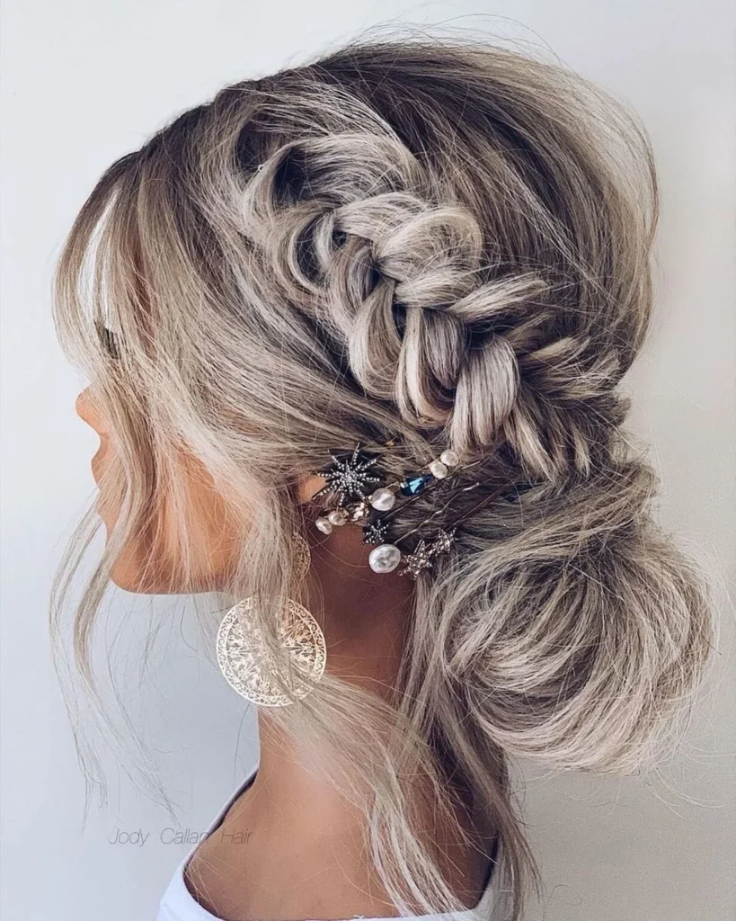 side braided hairstyle with low bun