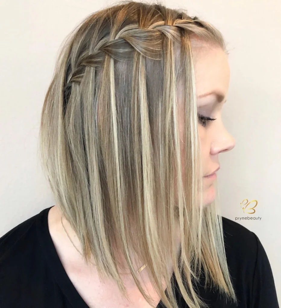 side braid hairstyle with wrapped bun