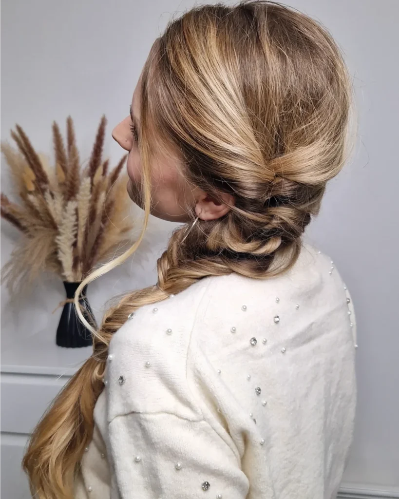 side braid hairstyle with low wrapped