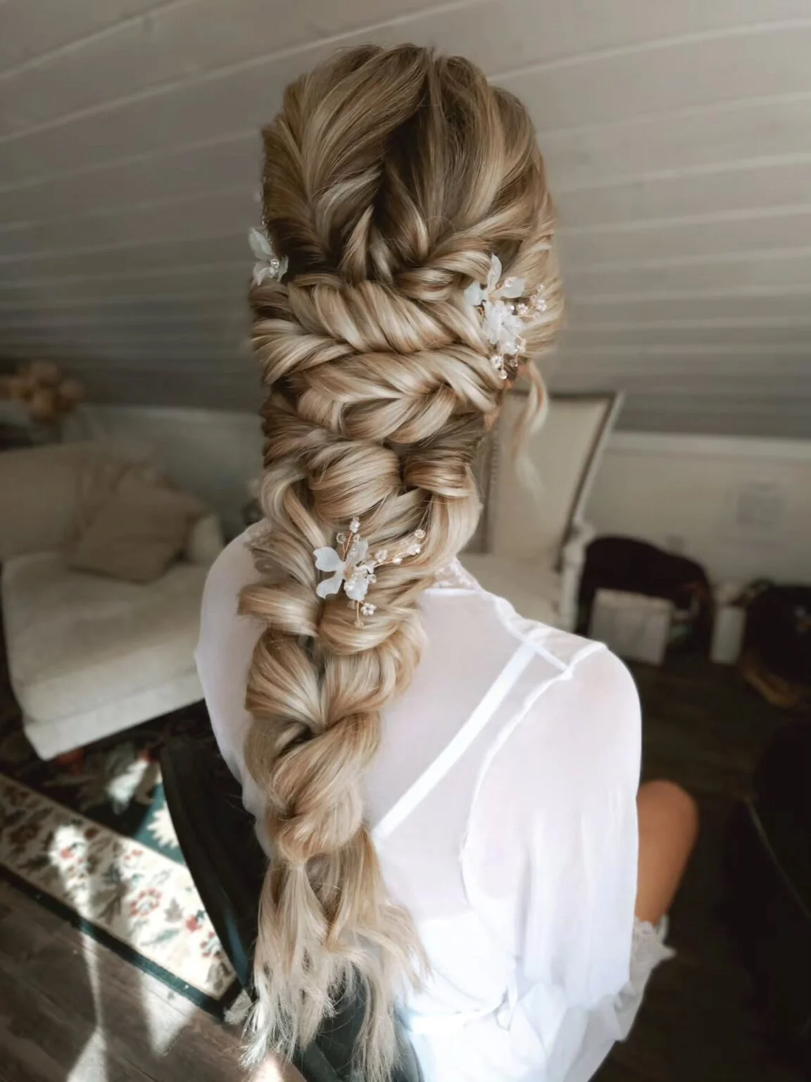 18 Bridal Braided Hairstyles with Pearls, Flowers, and Romantic Texture