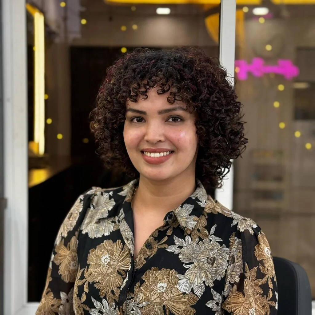 Rounded curly bob with soft fringe