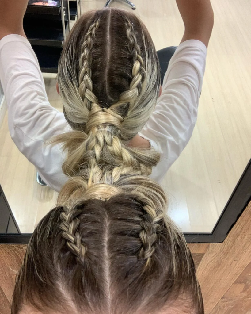 Wrapped low ponytail with two Dutch braids