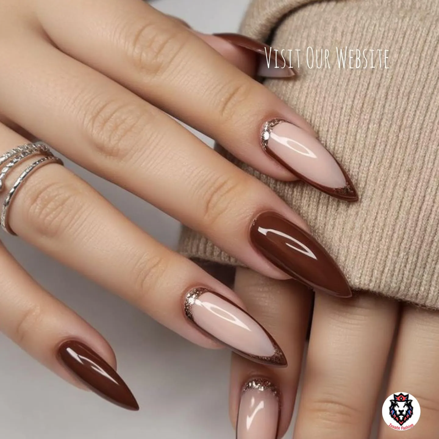 Almond nails mixing solid brown with nude bases and fine brown French borders