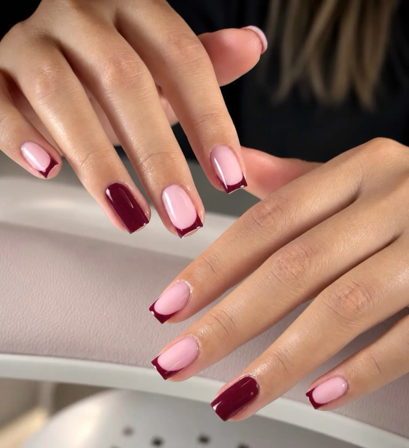 Square pink French nails with solid burgundy accent nails
