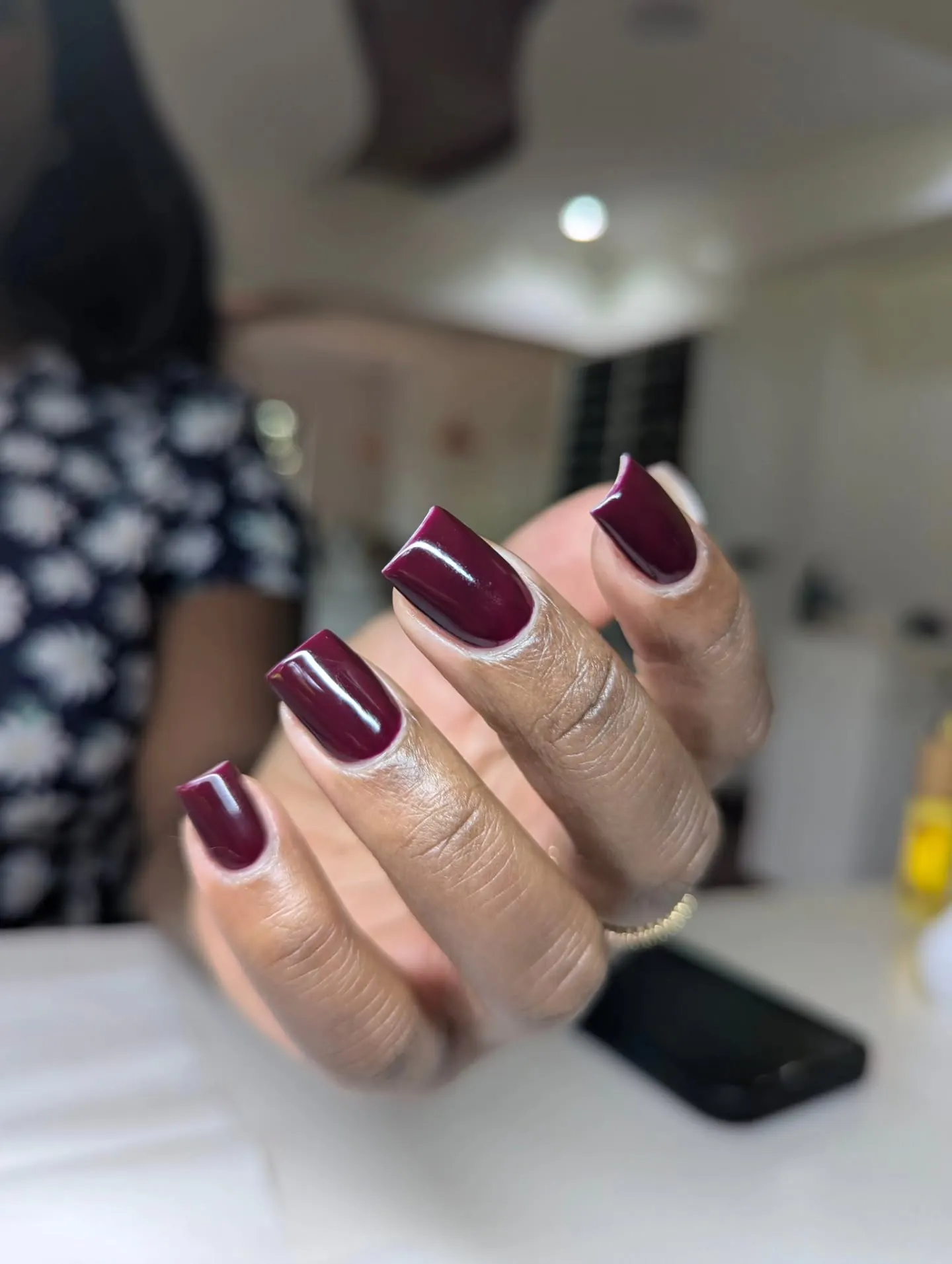 Muted burgundy nails with short squoval tips