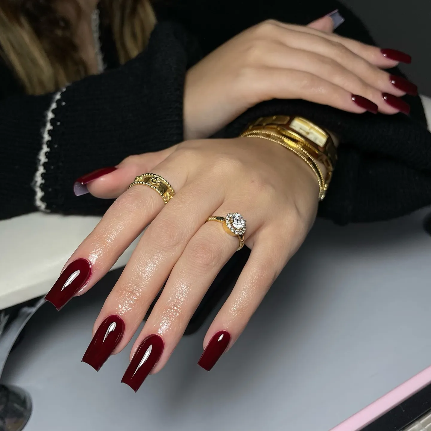 Long squared nails with glossy deep red polish