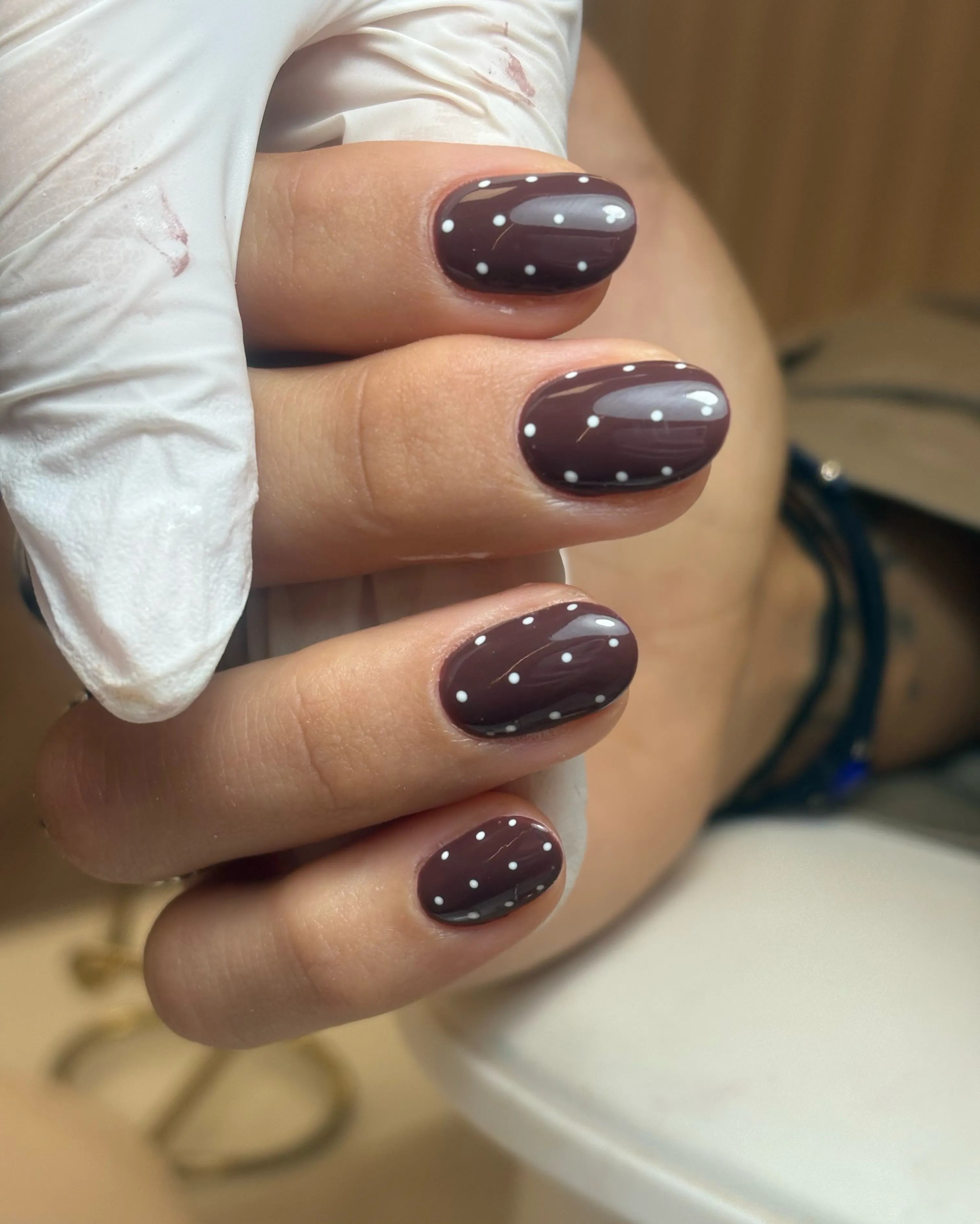 tiny sparkle details chocolate brown manicure