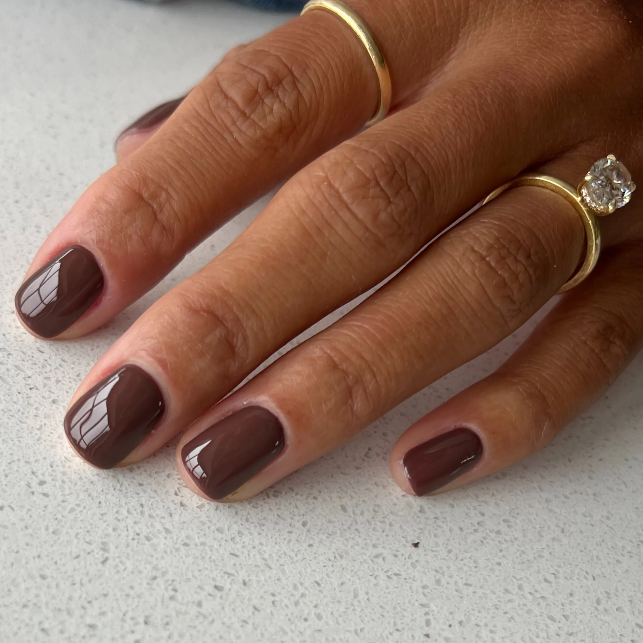 short chocolate ovals chocolate brown manicure
