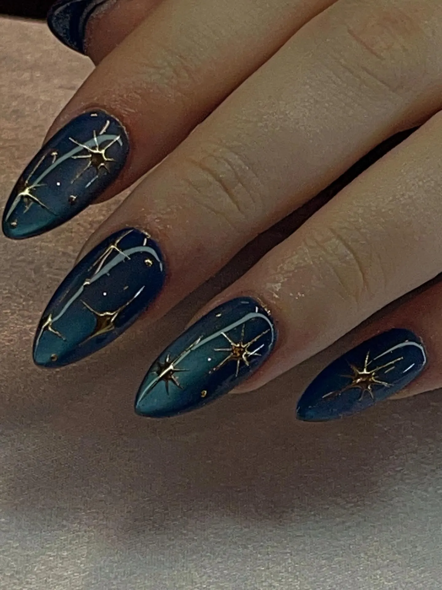 golden constellation lines manicure