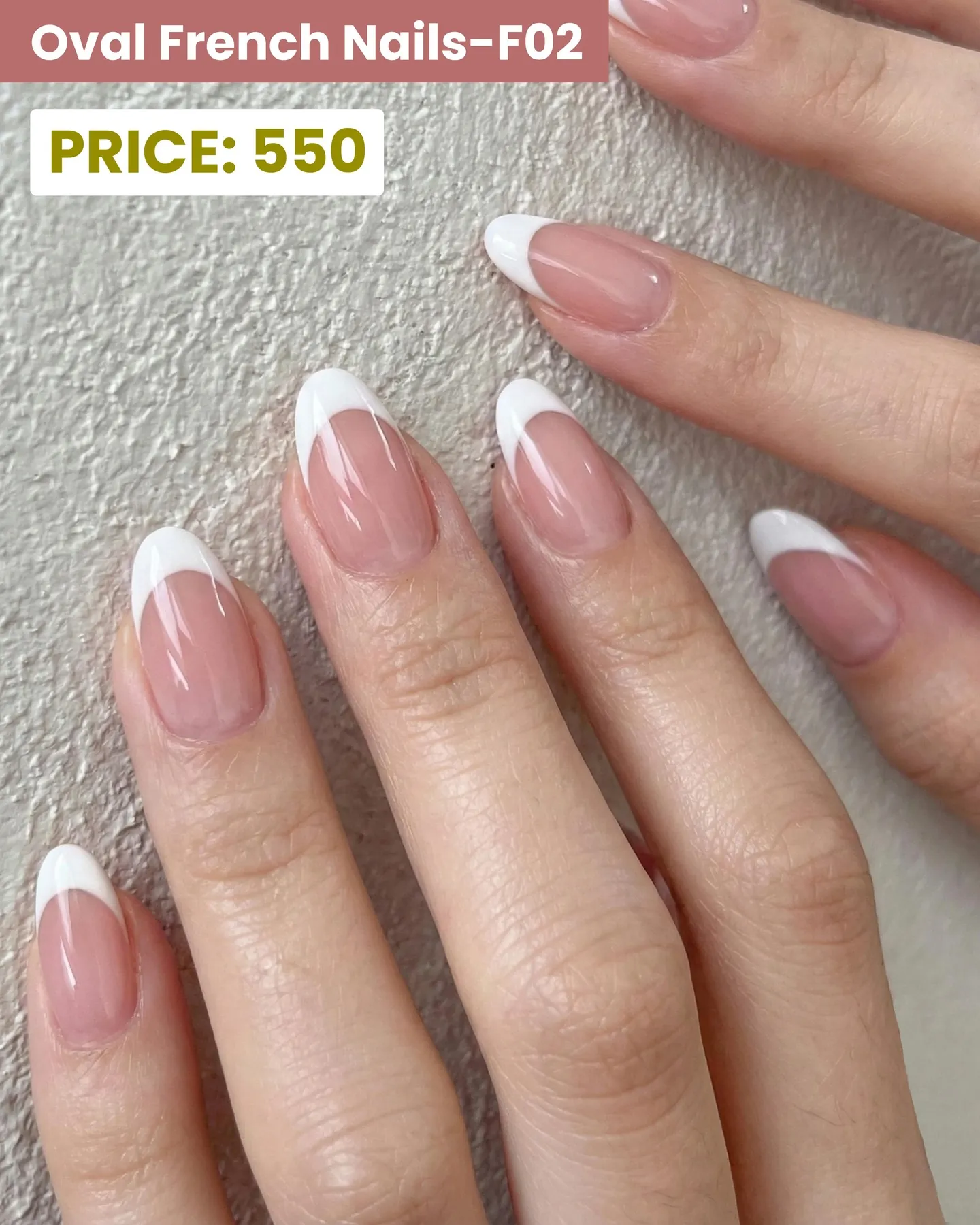 Pink oval nails with white French tips