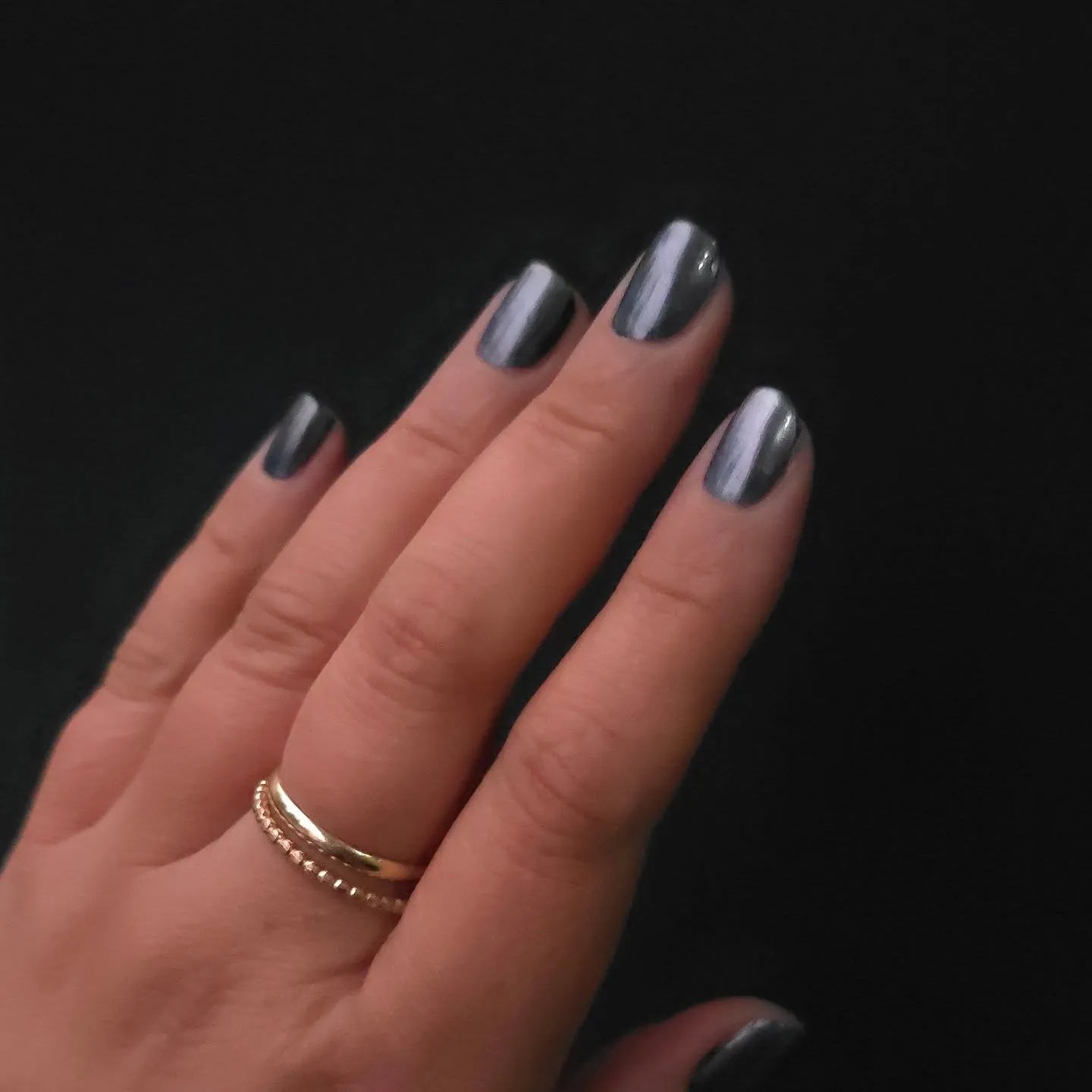 Navy blue starry French tips with nude bases