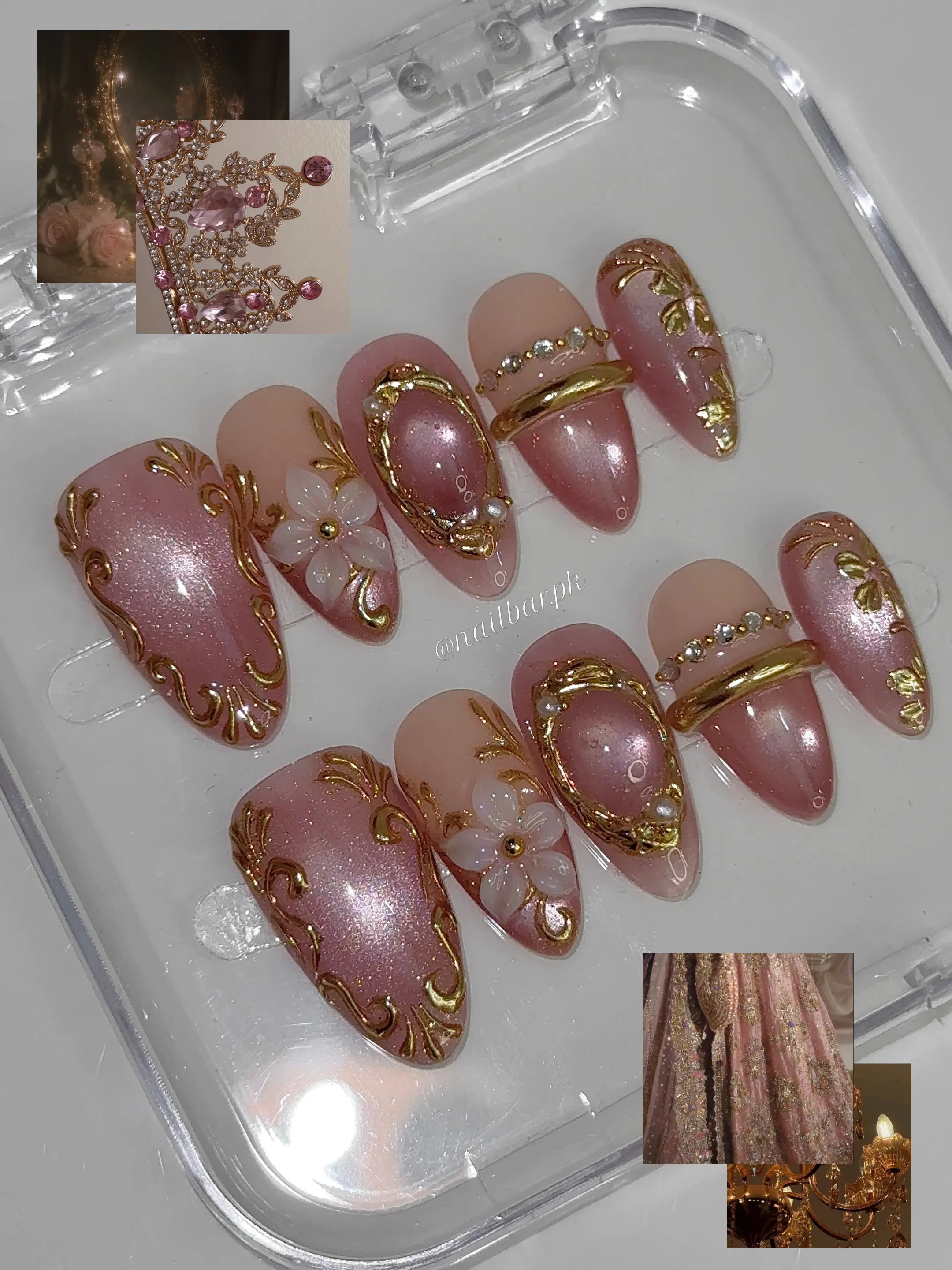 Displayed pearly pink nails with pale flowers, ornate gold frames and beaded bands
