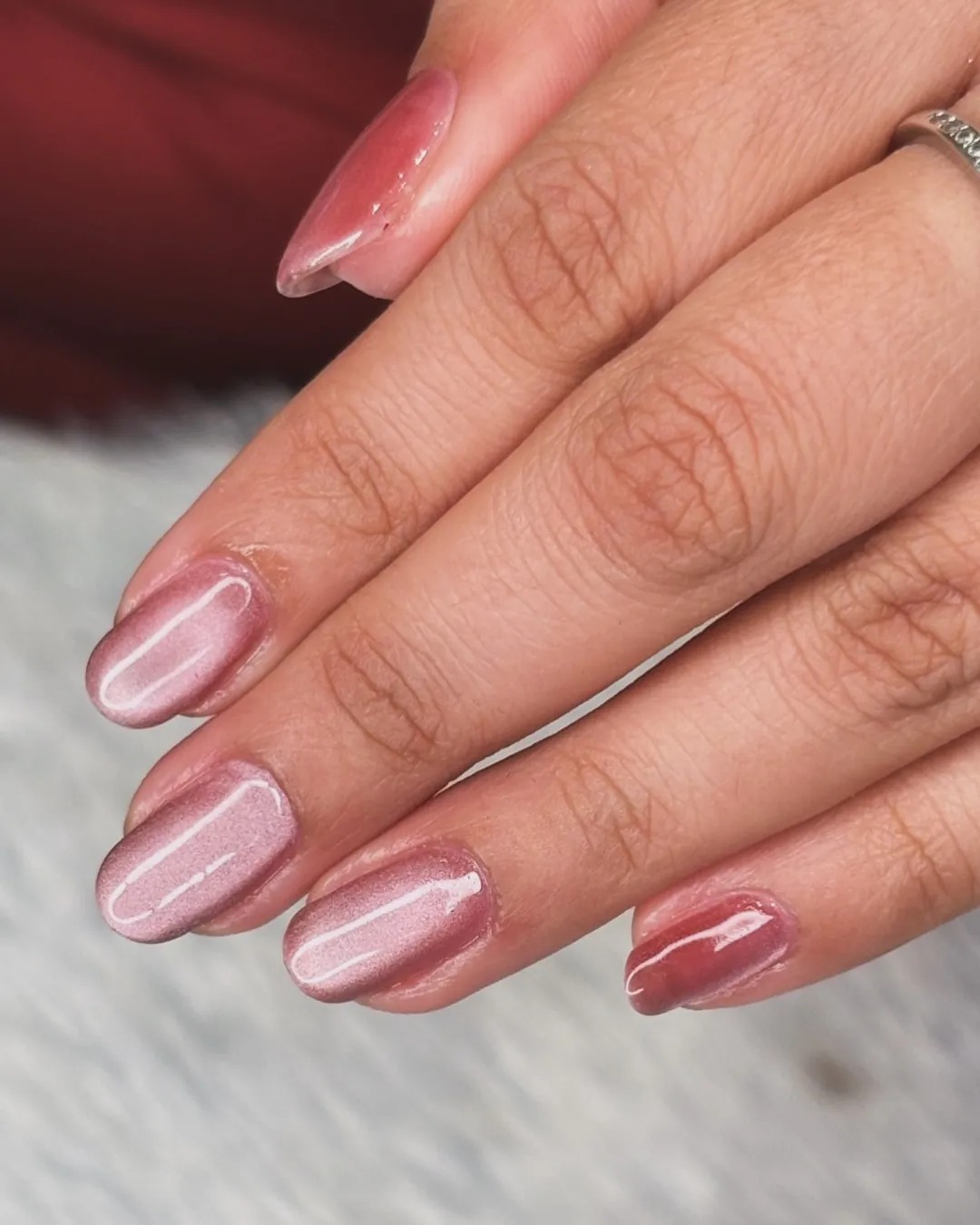 Sheer pink squoval nails with delicate reflective highlights