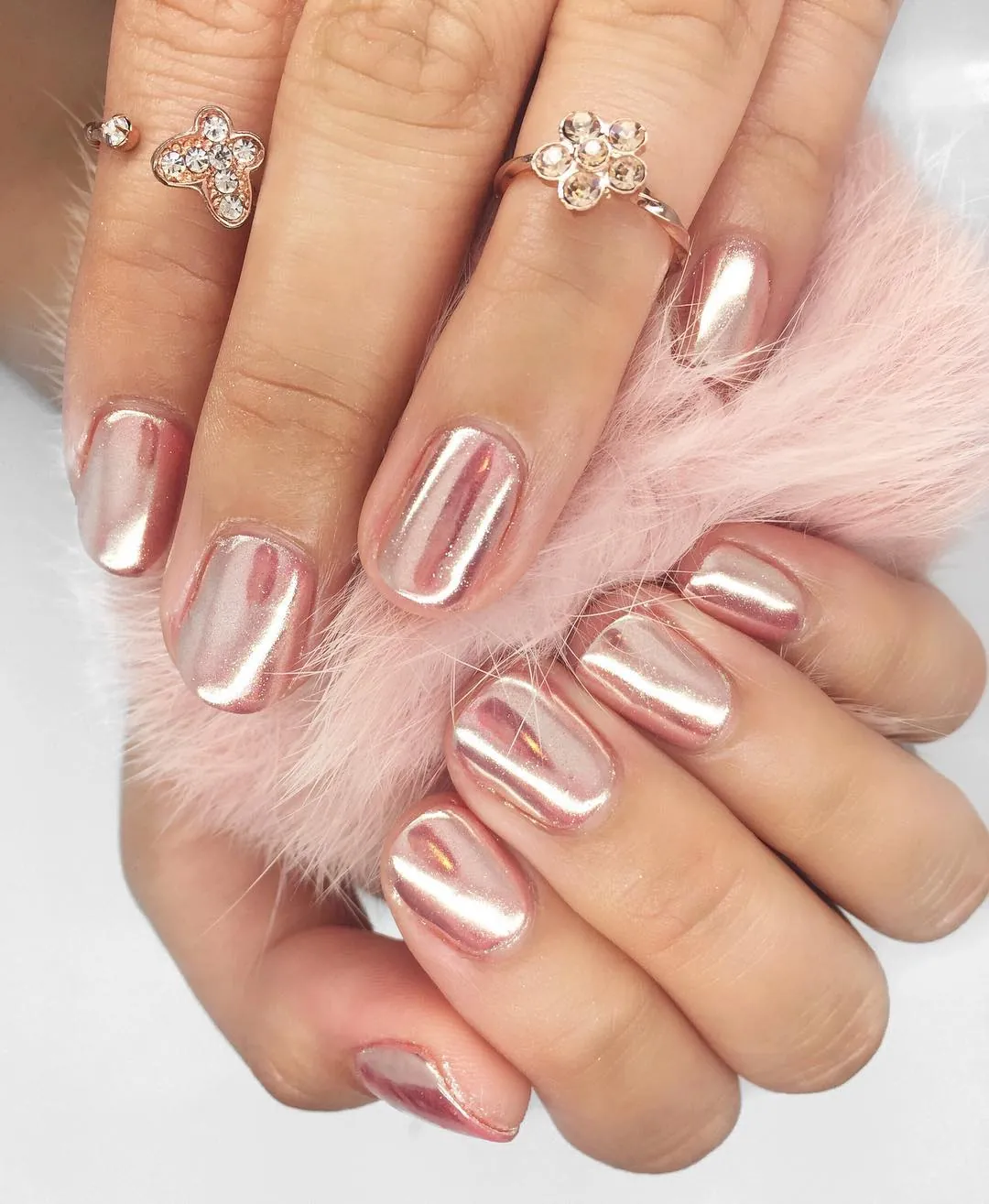 Rose gold mirror nails with softly squared tips