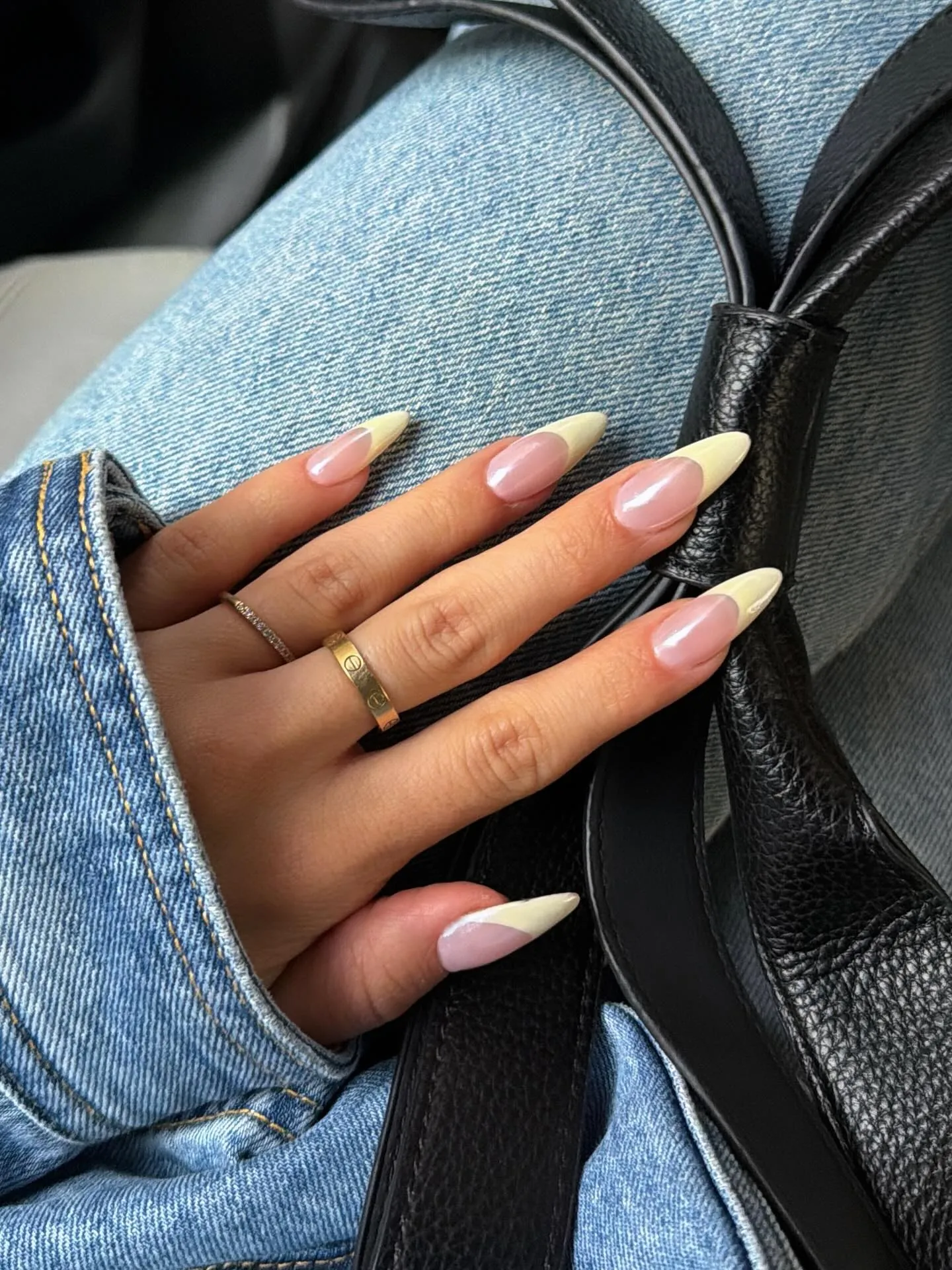 Long almond pink nails with pale yellow French tips